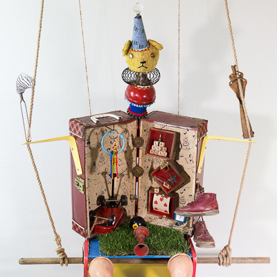 Gina M.  Baby Bare  from the Toy Box Kids Series, 2019  doll box, rope, found puppets and toys  68 x 38 x 28”  Courtesy of the artist