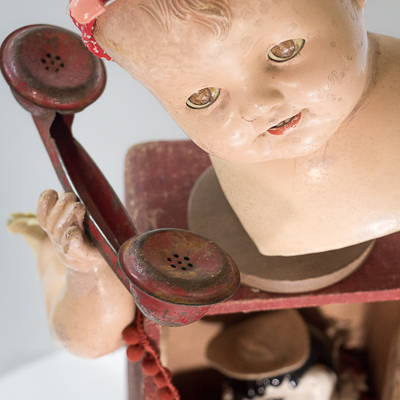 Gina M.  I Got This from the Toy Box Kids Series, 2018  assemblage, Clippo clown puppet, red wooden wagon, doll parts, sewing trim, toys  24 x 24 x 12”  Courtesy of the artist