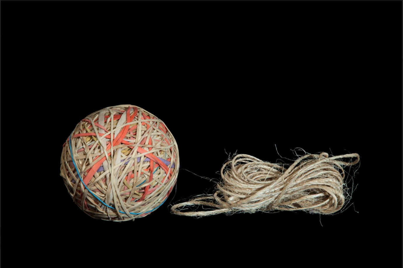 rubber band ball next to twine