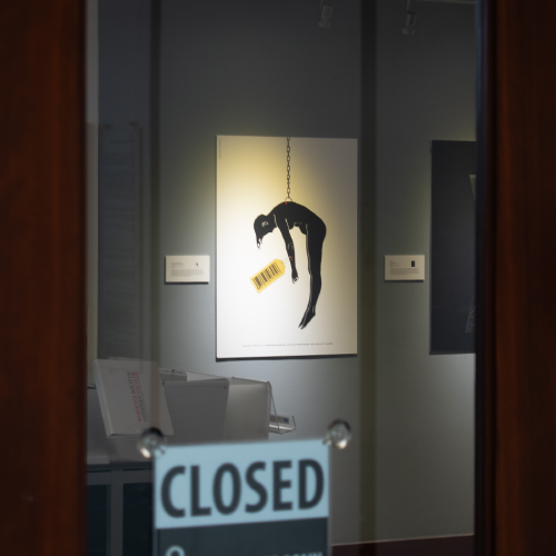 Door shut in front of the Huntley Gallery with a closed sign showing.