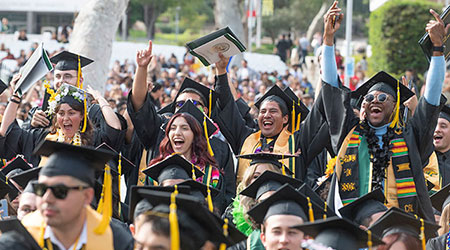 College of Science Graduates cheer during the 2023 commencement ceremonies.