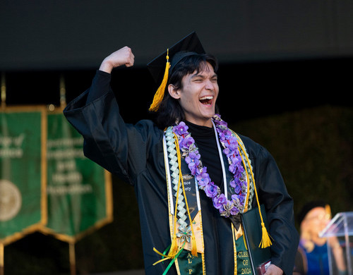 student cheering at a graduation ceremony 