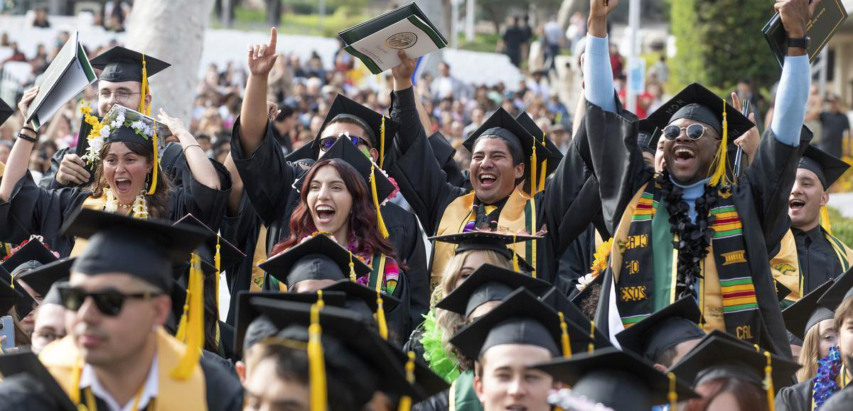 Cheerful graduates at commencement ceremony