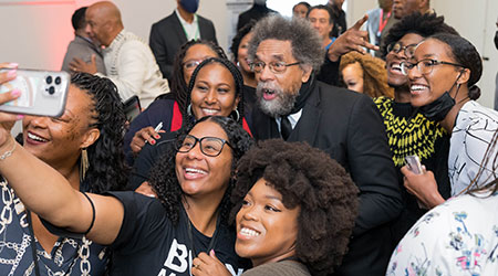Cornell West poses with participants at the CSU Inaugural Juneteenth Symposium. (Photo courtesy of CSU.)