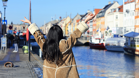 exchange student raising hands