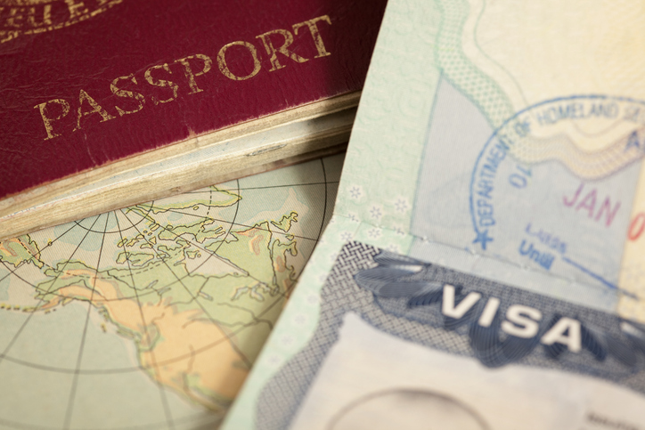 photo of a passport and visa