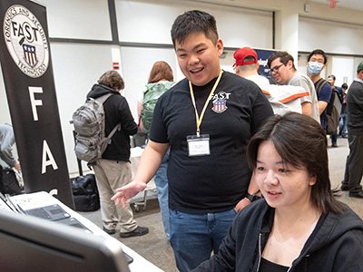 Two Cal Poly Pomona Students attending the Artificial Intelligence Fair