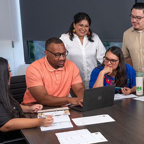 people gathered around a conference table