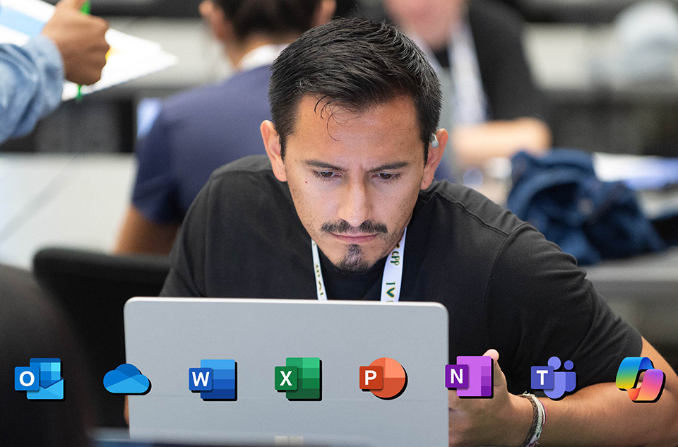 A student working on his laptop