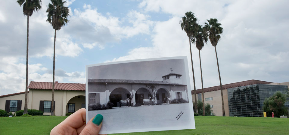 CPP old horse stables with old photograph in foreground