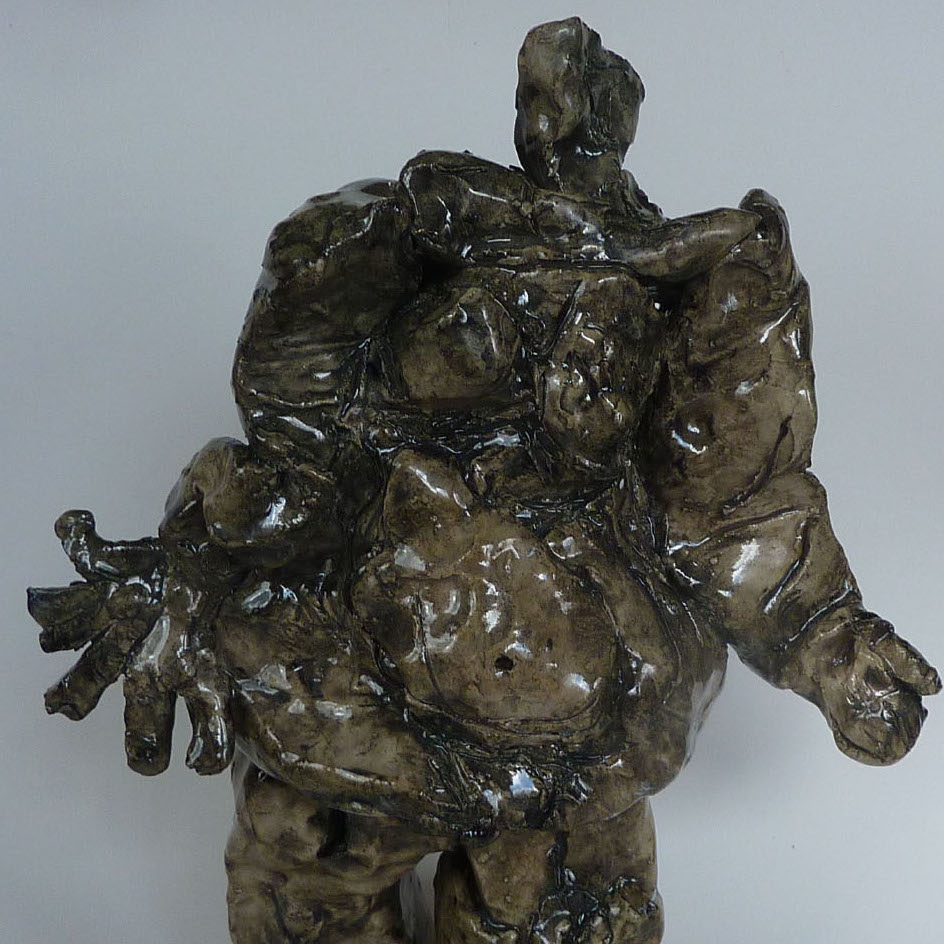 A. Binghamfreeman, Standing Figure, 2018. Clay and glaze. 15 x 9.5 x 4.5" Courtesy of the artist. A distored figure that is colored black, brown, and grey