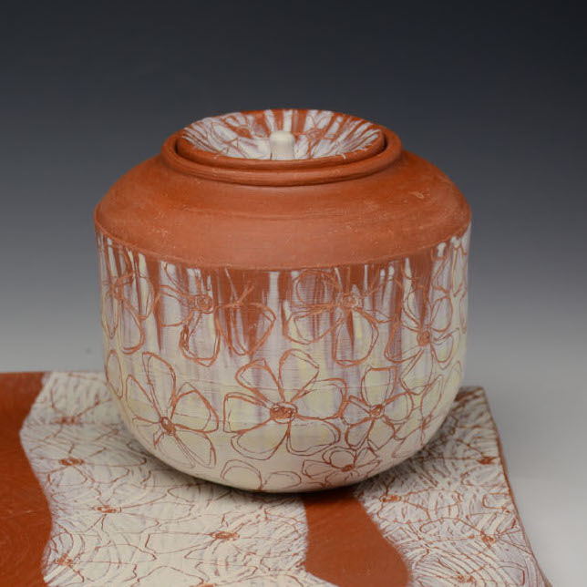 Irina Bondarenko, Tea Caddy VII, 2018. Low fire terracotta, sgrafitto on terra sigilata 5 x 10 x 7" Courtesy of the artist. A tea caddy with flowers drawn on the surface