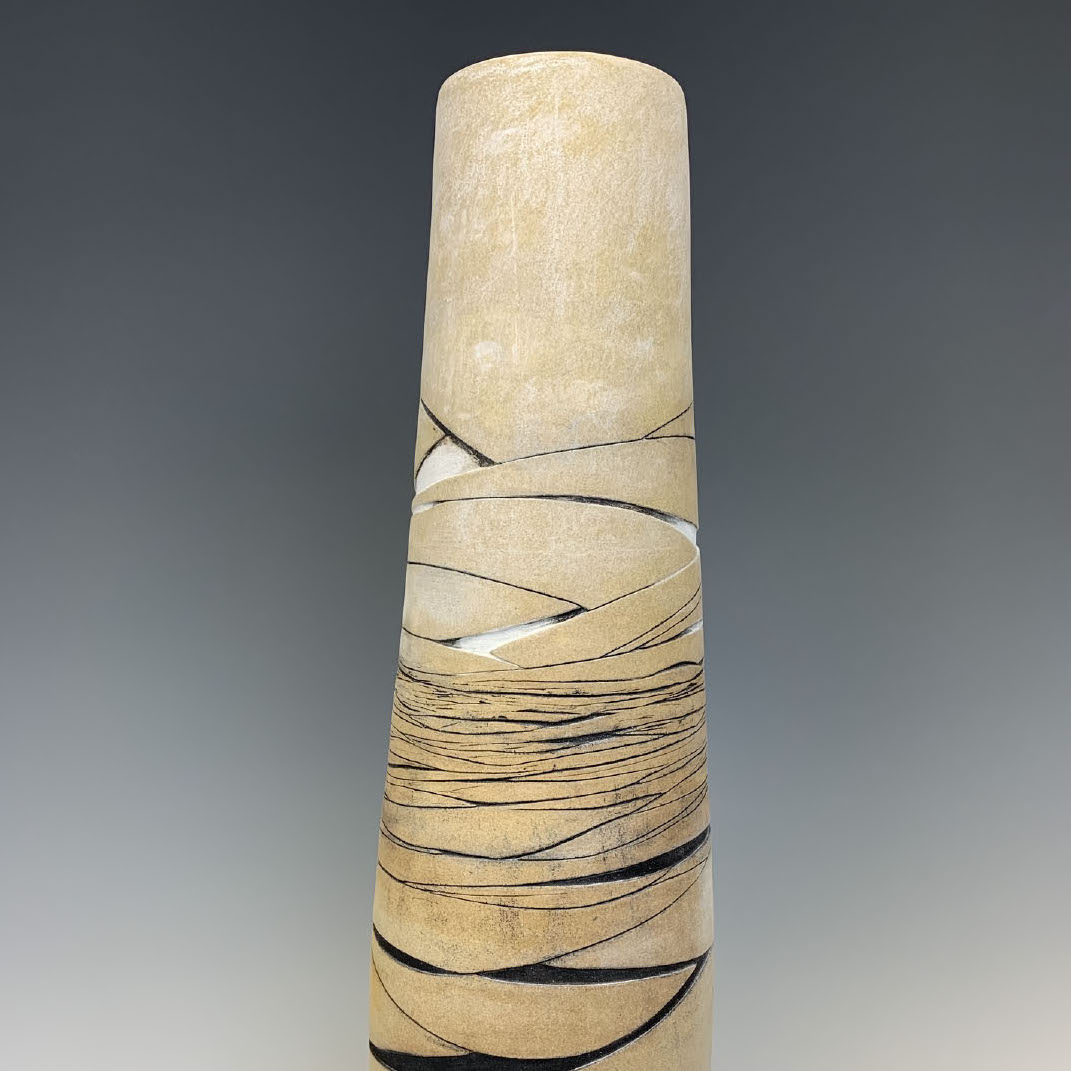 Shahin T. Massoudi, Land, 2019. Ceramic 23.5 x 7 x 7” Courtesy of the artist. A sculpture of a vertical vessel with lines along the middle section