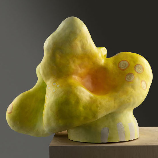 Nina Temple, Marvin, 2018. Clay, acrylic and ink. 18.5 x 19.5 x 16.25” Courtesy of the artist. A yellow clay sculpture of a biomorphic shape with colored details throughout the surface area.