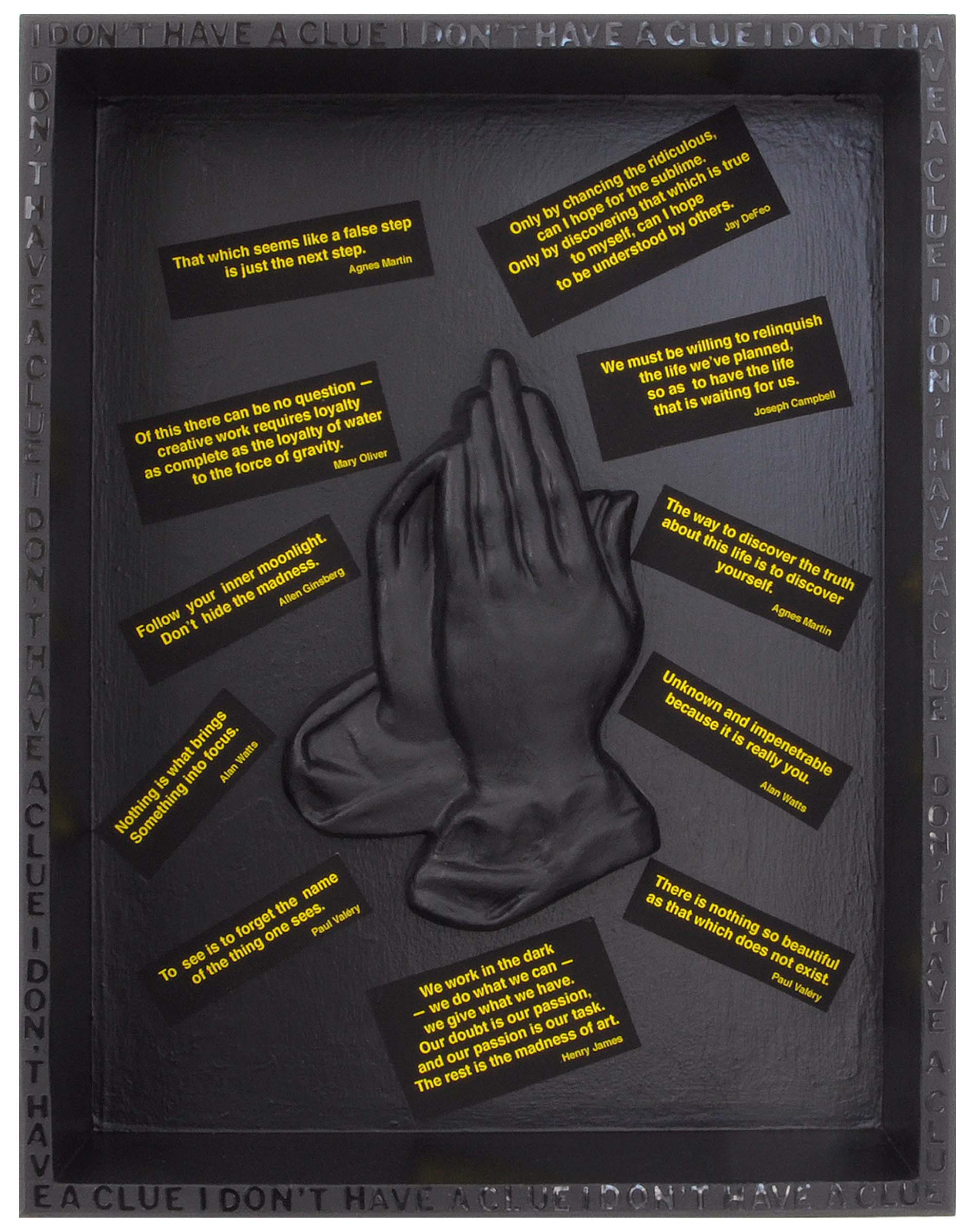 Two hands together in prayer position with black boxes with yellow text surrounding the hands