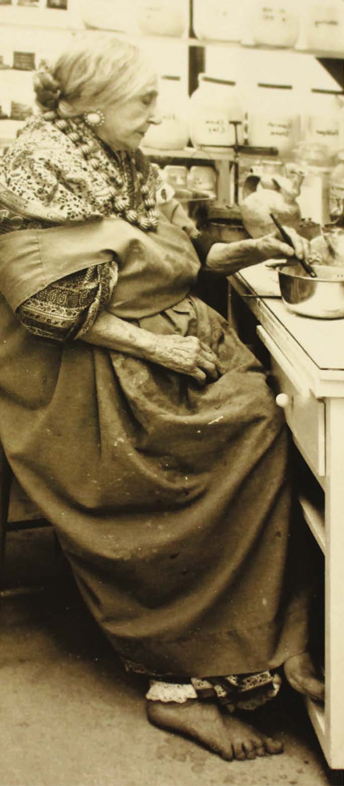 Artist Beatrice Wood working at her studio. navigate down for further details