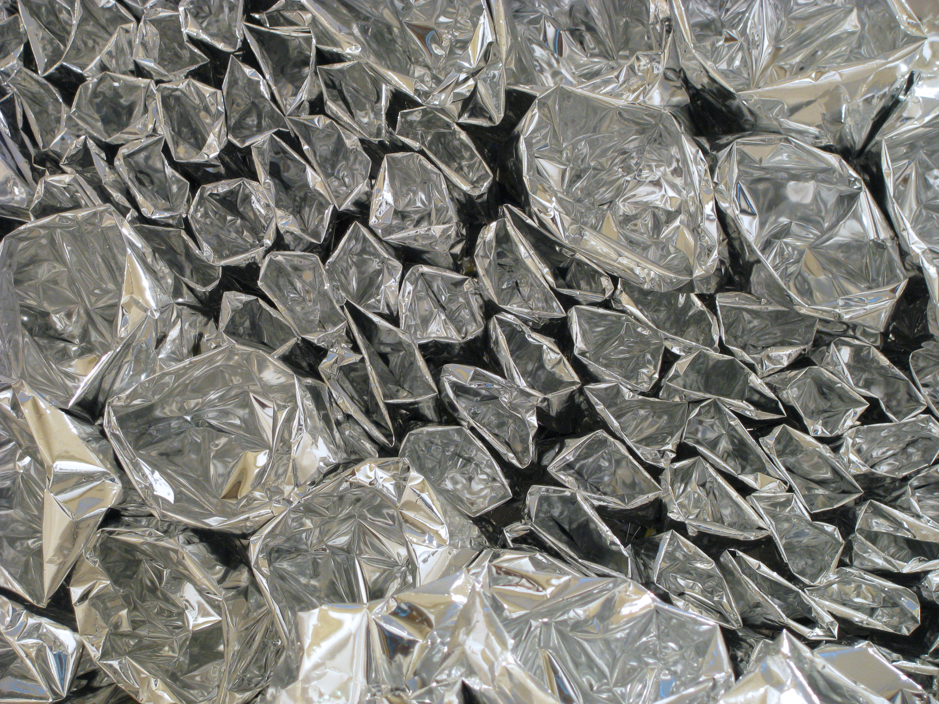 David Jang, detail of "Novelty" installation. Detail of inverted chip bags resulting in a silvery texture effect.