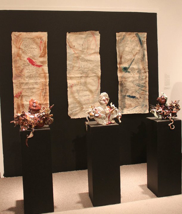 Shelley Bruce. High fired ceramic and mixed media installation. Series of 3 busts.