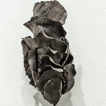 Lillian Abel, "Perpetual Cadence II" black and grey abstract sculpture.
