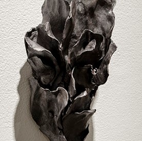 Lillian Abel, "Perpetual Cadence I" black and grey folded sculpture.