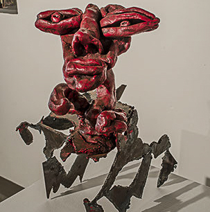 Ann Bingham-Freeman, "Finklesteins Bust." A red sculpture. 
