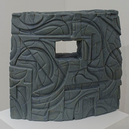 Francisco “Pancho” Jimenez, "Sentry" a cool grey cube like sculpture with organic lines.
