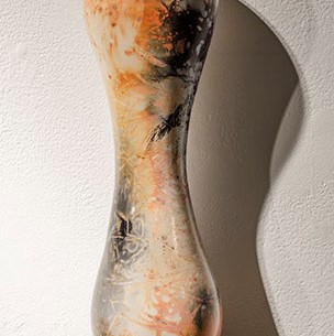 Gale McCall, "Untitled." A sculpture in an organic shape, it has black, orange, and white.
