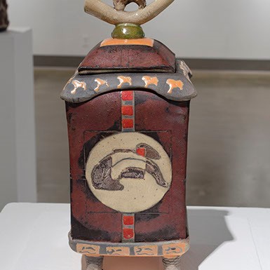 Daniel Oliver, "Pot Belly Box Series." Shows a rectangular object that is black and red.