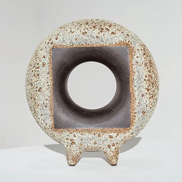 Heather Rosenman, "Transforma Morph" an abstract circular sculpture with a hole in the middle.