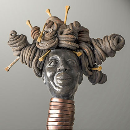 hand-built with organic material slips, terra sigil-lata, rutile and copper oxide of the head of a South American lady