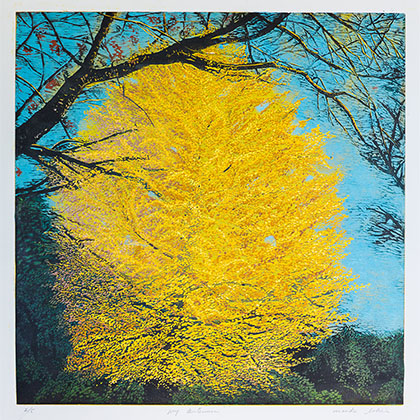 linocut-reduction of a yellow autumn tree