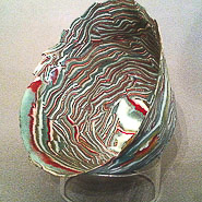 Cracked Egg Series XXII from the Cracked Egg Series, 2017 Nerikomi: stacked layers of colored porcelain are sliced through the cross section to reveal a pattern. Slices are rolled thin and arranged over a hump mold to form a vessel. 5 x 5 x 6.5” Courtesy of the artist