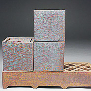 Three Boxes with Lattice Stand, 2016 stoneware rust engobe, interior Chun clear glaze 7.5 x 14.5 x 5.25” Courtesy of the artist