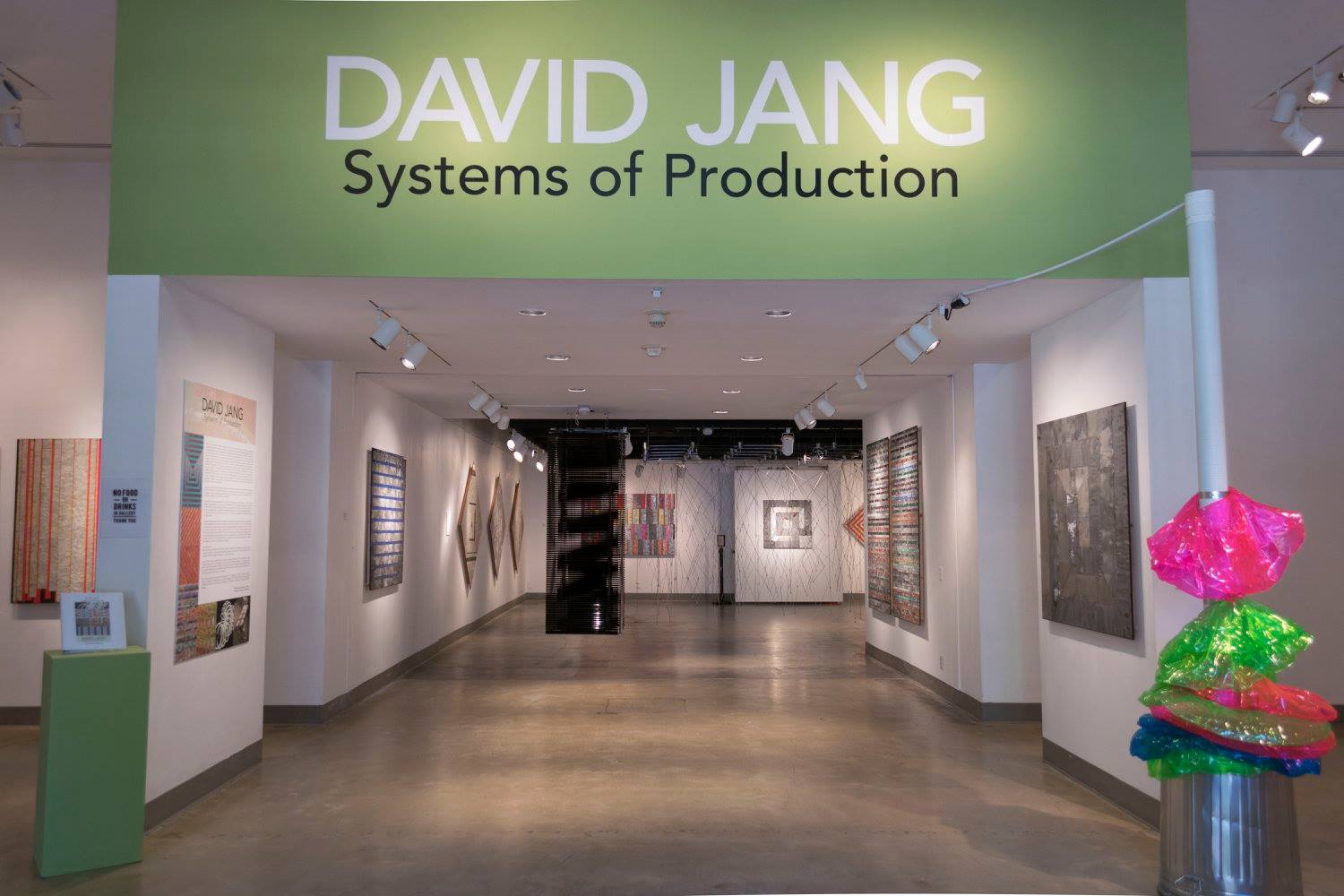 Installation View, Title Wall, David Jang: Systems of Production, Feb 22 - Apr 26, 2018, Curator: Michele Cairella Fillmore, W. Keith & Janet Kellogg Art Gallery, Cal Poly Pomona. [Gallery Shot showing David Jang's dynamic works]