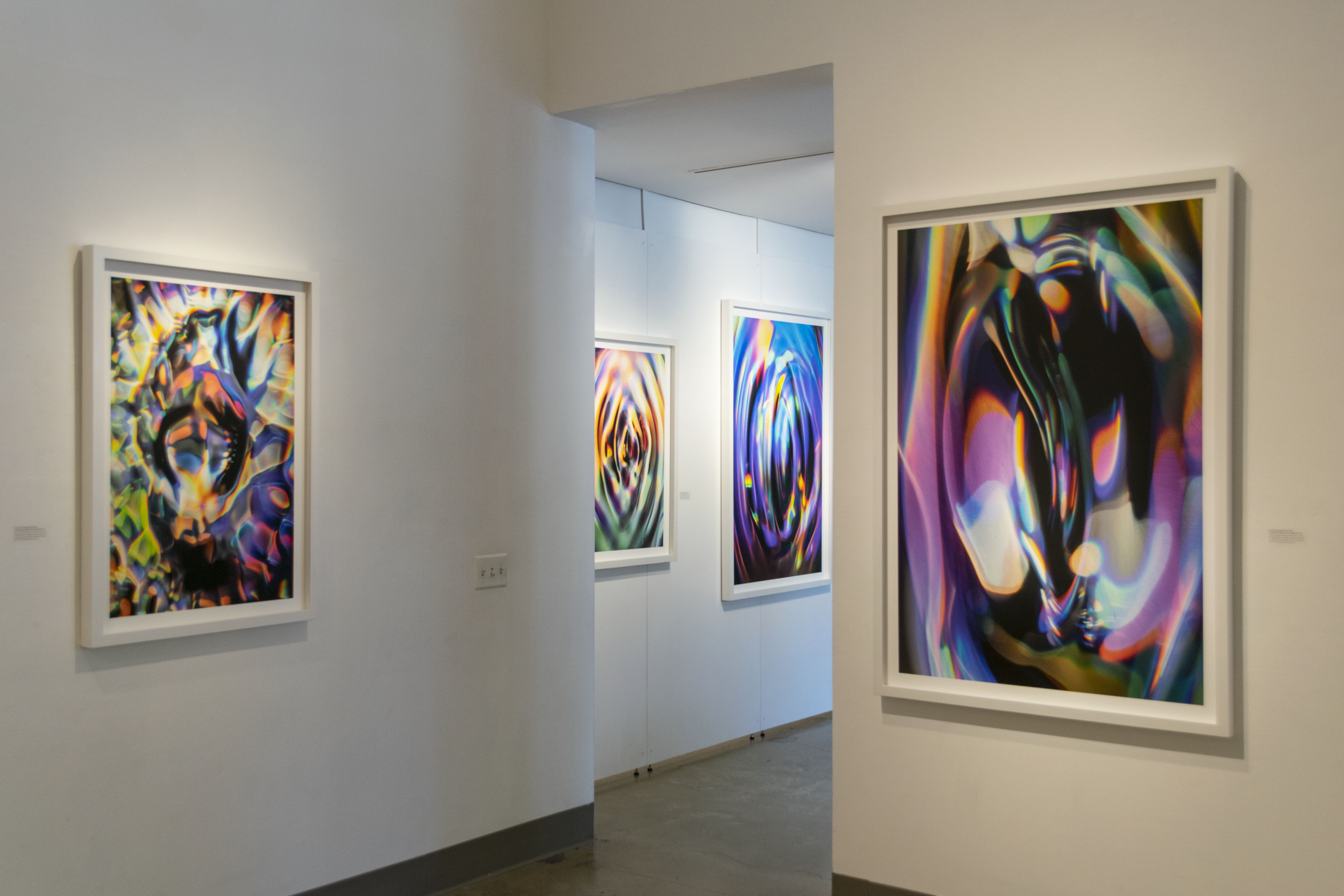 Eastside view of gallery, Exhibition: Sasha vom Dorp: 15.15 Hz, Aug. 23 - Oct. 18, 2018, Curator: Michele Cairella Fillmore, W. Keith & Janet Kellogg Art Gallery, Cal Poly Pomona. [Artist Sasha vom Dorp captures the interaction of light, sound and water in high-speed photography (Photo Credit: William W. Gunn)]