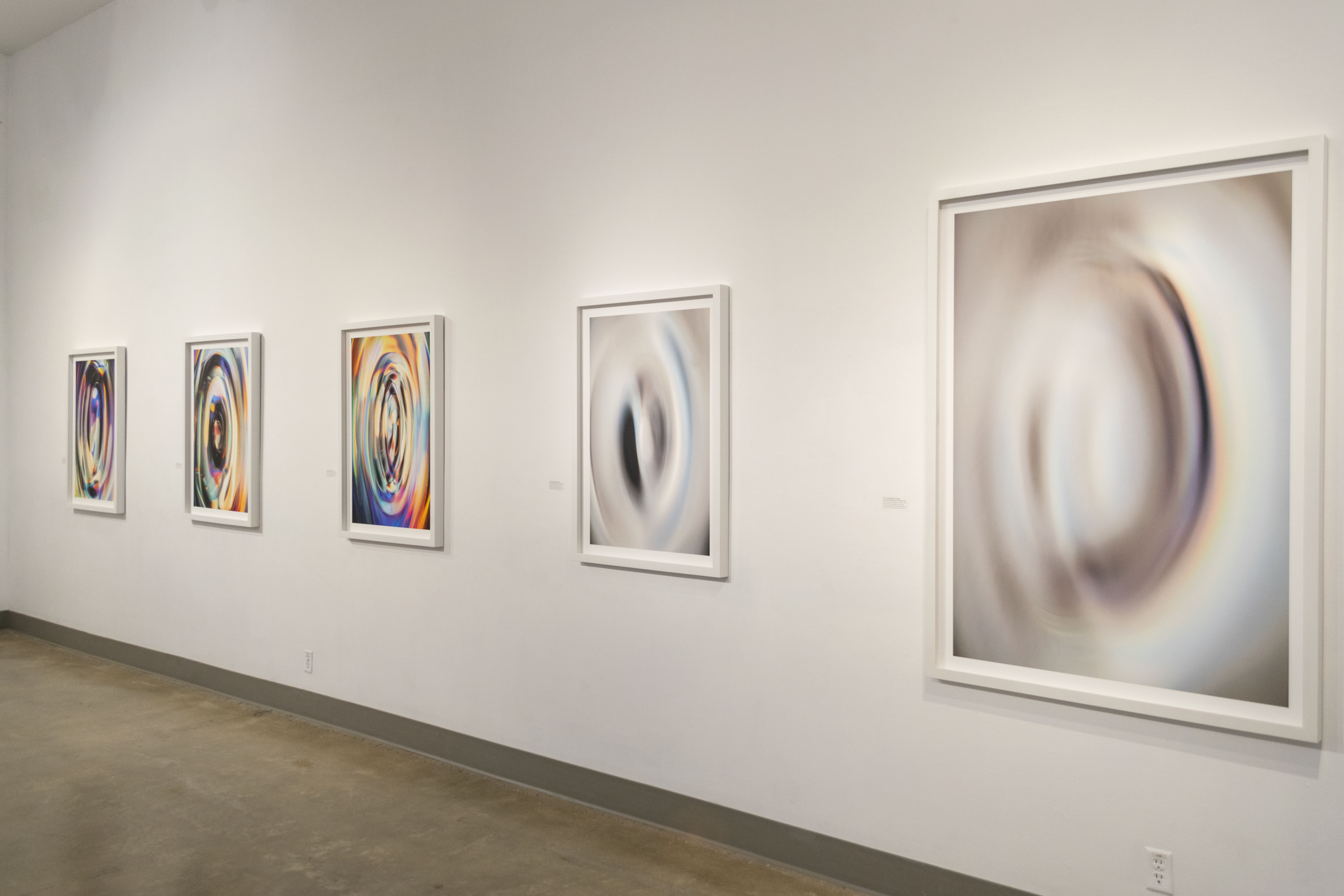 Eastside of gallery, Exhibition: Sasha vom Dorp: 15.15 Hz, Aug. 23 - Oct. 18, 2018, Curator: Michele Cairella Fillmore, W. Keith & Janet Kellogg Art Gallery, Cal Poly Pomona. [Artist Sasha vom Dorp captures the interaction of light, sound and water in high-speed photography (Photo Credit: William W. Gunn)]