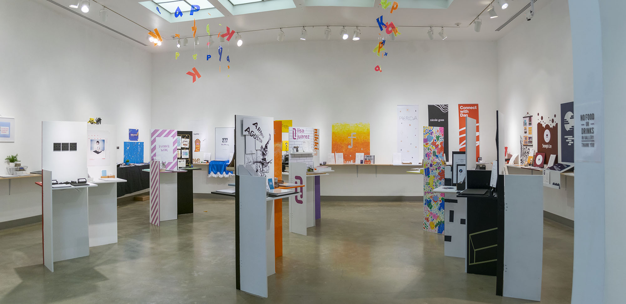 Senior Portfolio area at front of gallery, Exhibition: PolyKroma 2019, Apr. 27, 2019 to May 19, 2019, Co-curated by Michele Cairella Fillmore & Sooyun Im, W. Keith & Janet Kellogg Art Gallery, Cal Poly Pomona. 