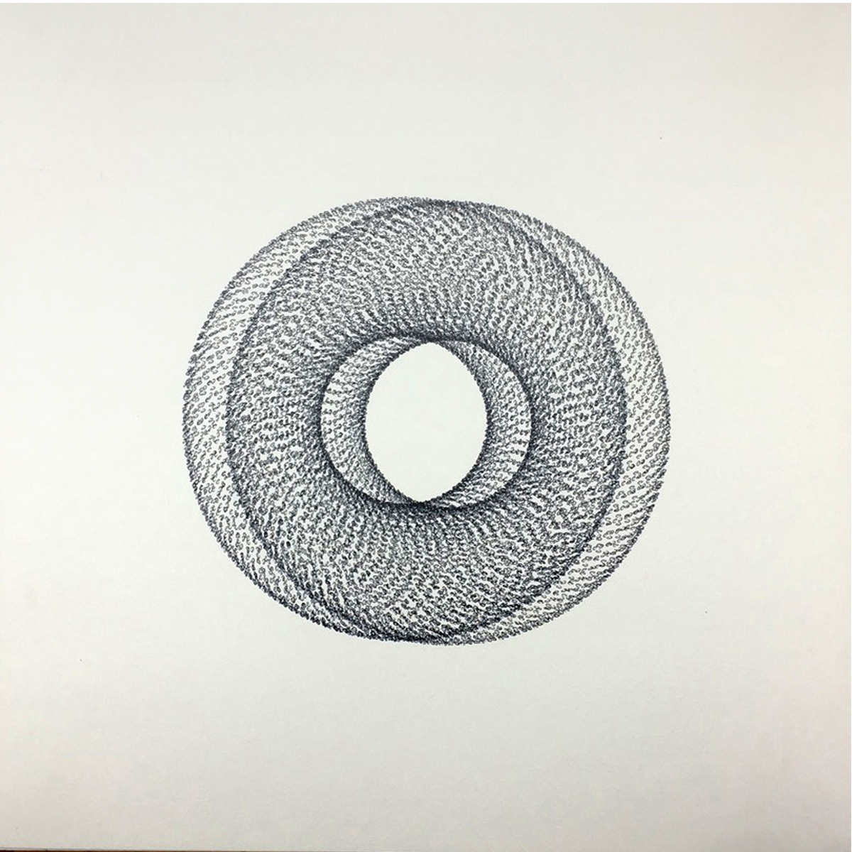 two circles on top of each other with one being smaller and small lines to give dimension and texture. Circles are made of small letterforms using black ink on white paper.