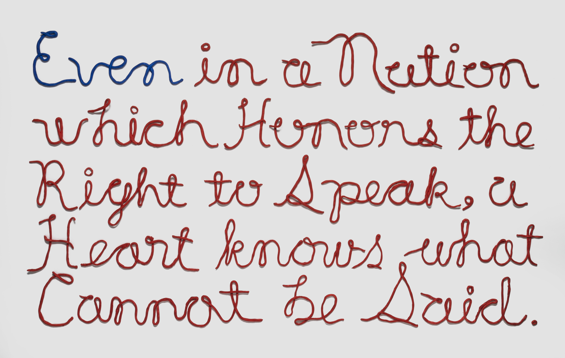  red and blue cursive lettering for a poem: Even in a Nation which Honors the Right to Speak, a Heart knows what Cannot be Said.