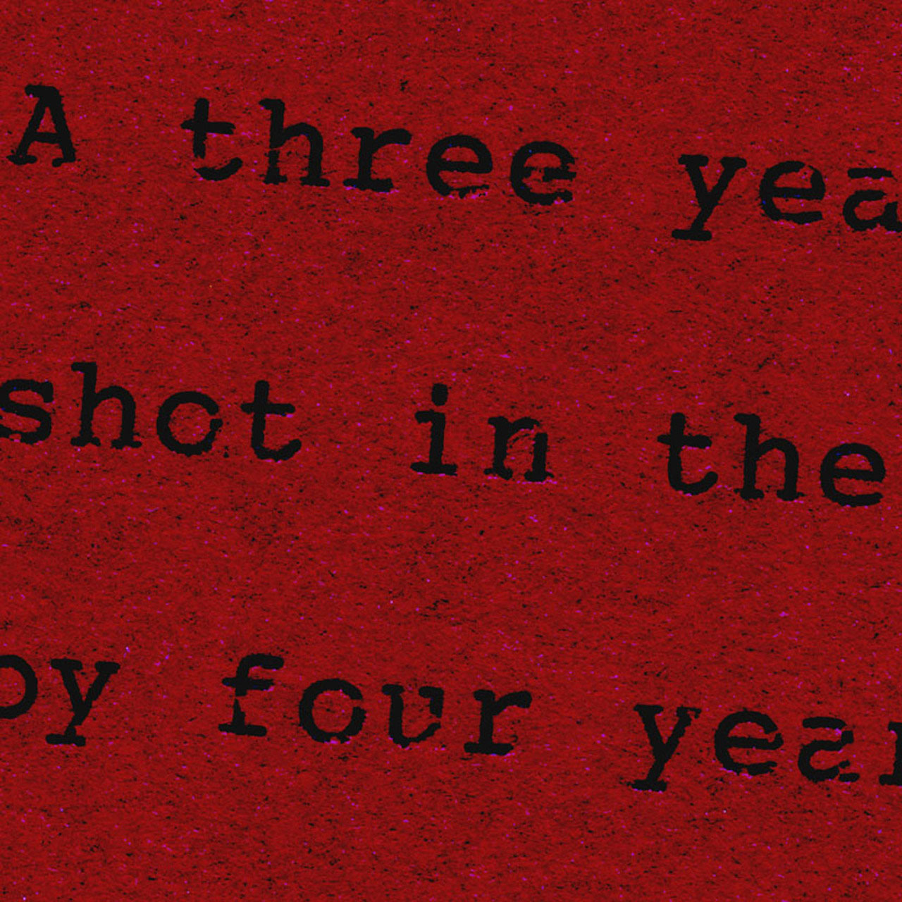 a red background with black printed words that say, "A three year old shot in the mouth by four year old" across the print.