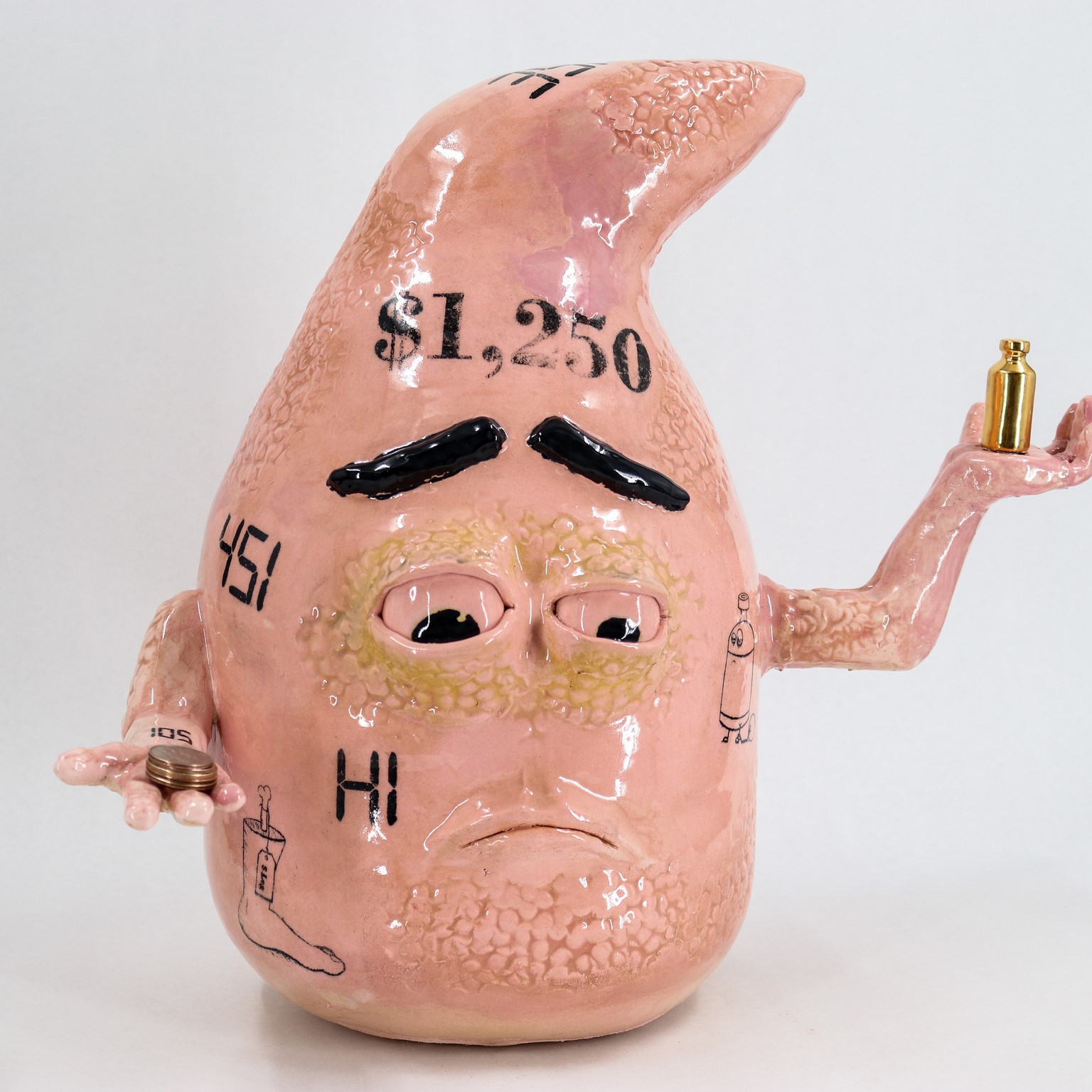 salmon-colored, shiny sculpture of a blob character with arms held up holding a few coins in one hand and a small gold container in the other. The blob character has sad eyes that are looking down. It has various black letters and numbers and drawing on it.