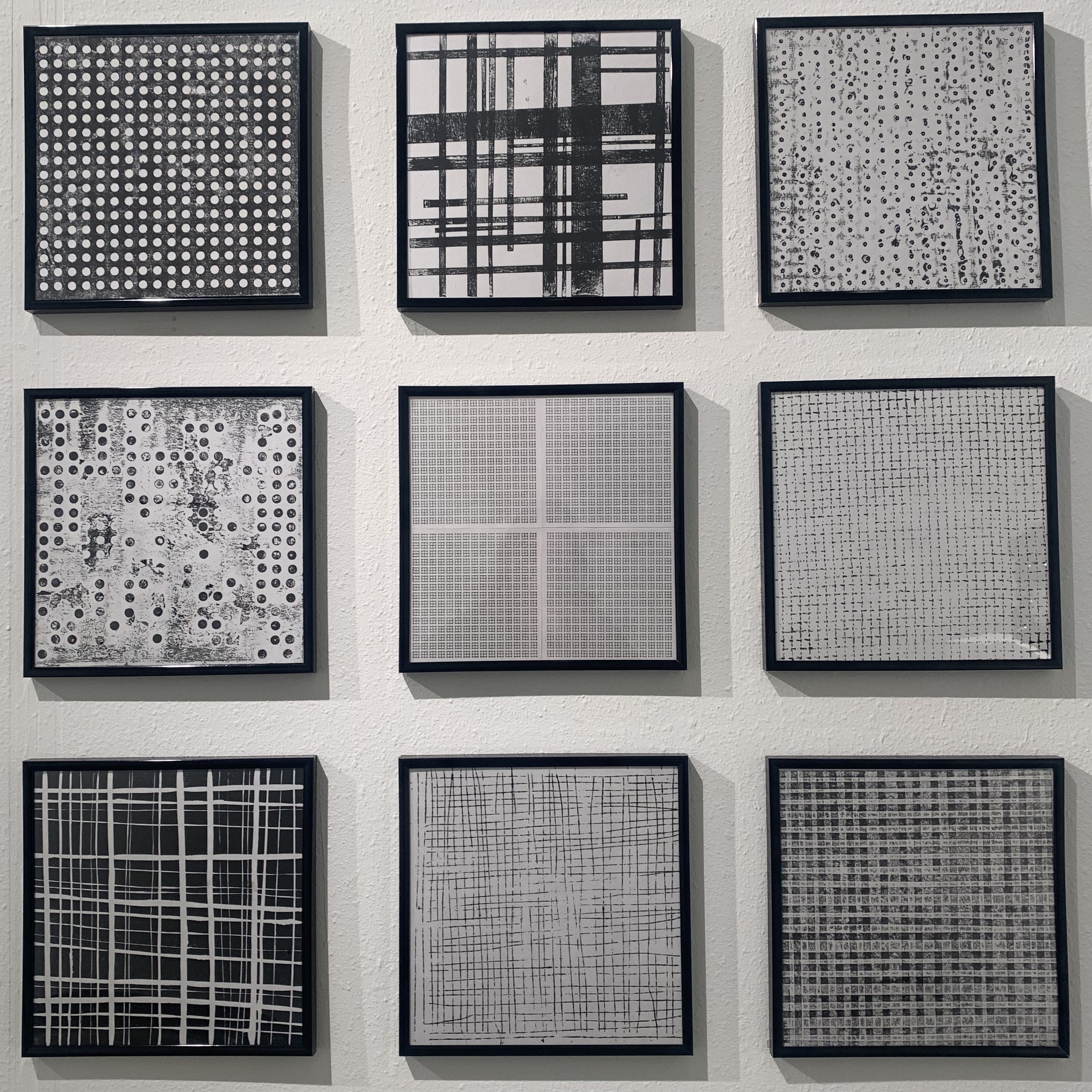 Grid of Grids: Image description: Artwork is a group of nine gridded black and white artworks.