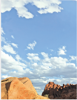 VF3723: Image Description: Photograph of landscape of blue sky and brown ground.