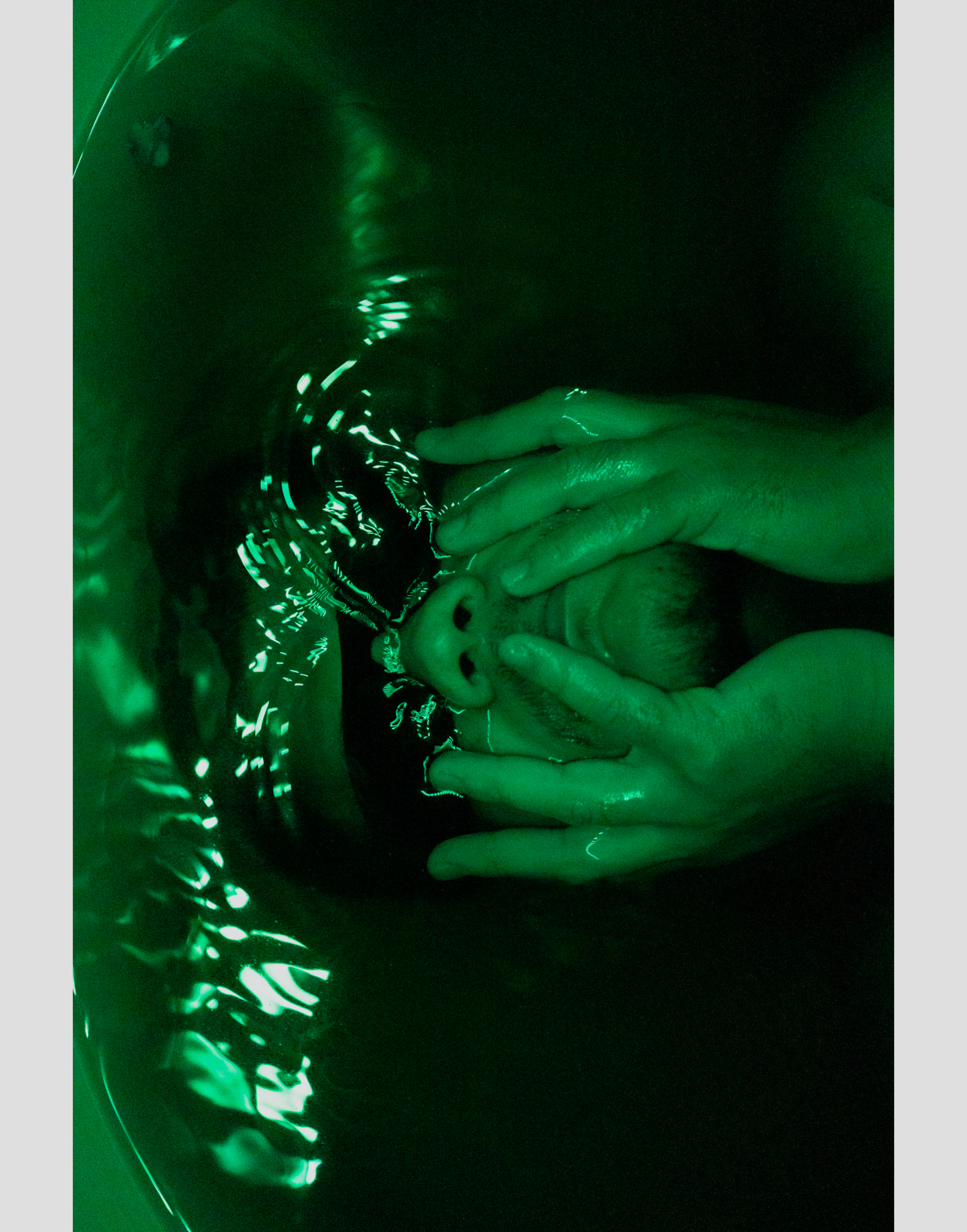 An image of a man in green liquid