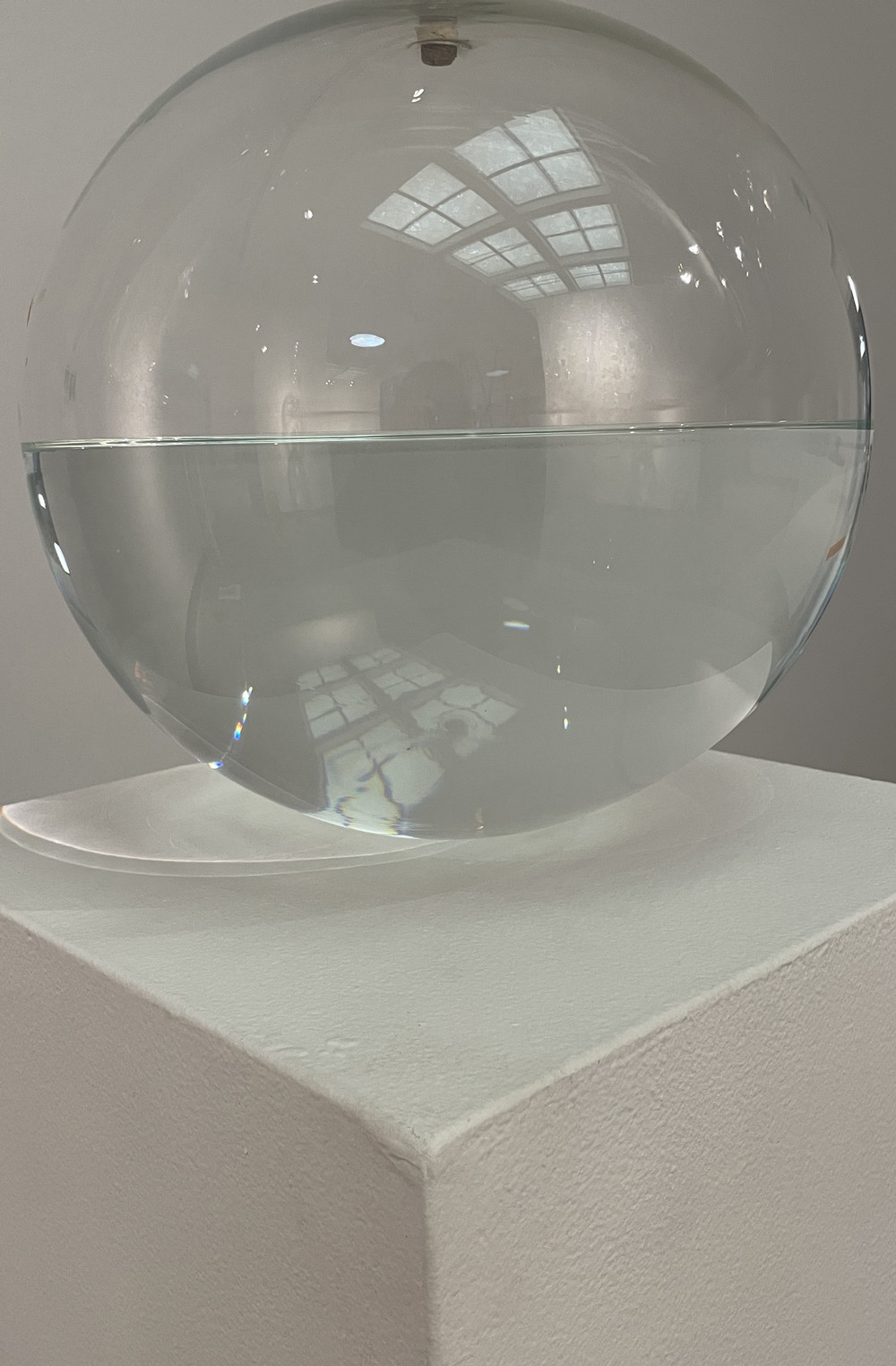 Katherine grey glass sphere with water half full