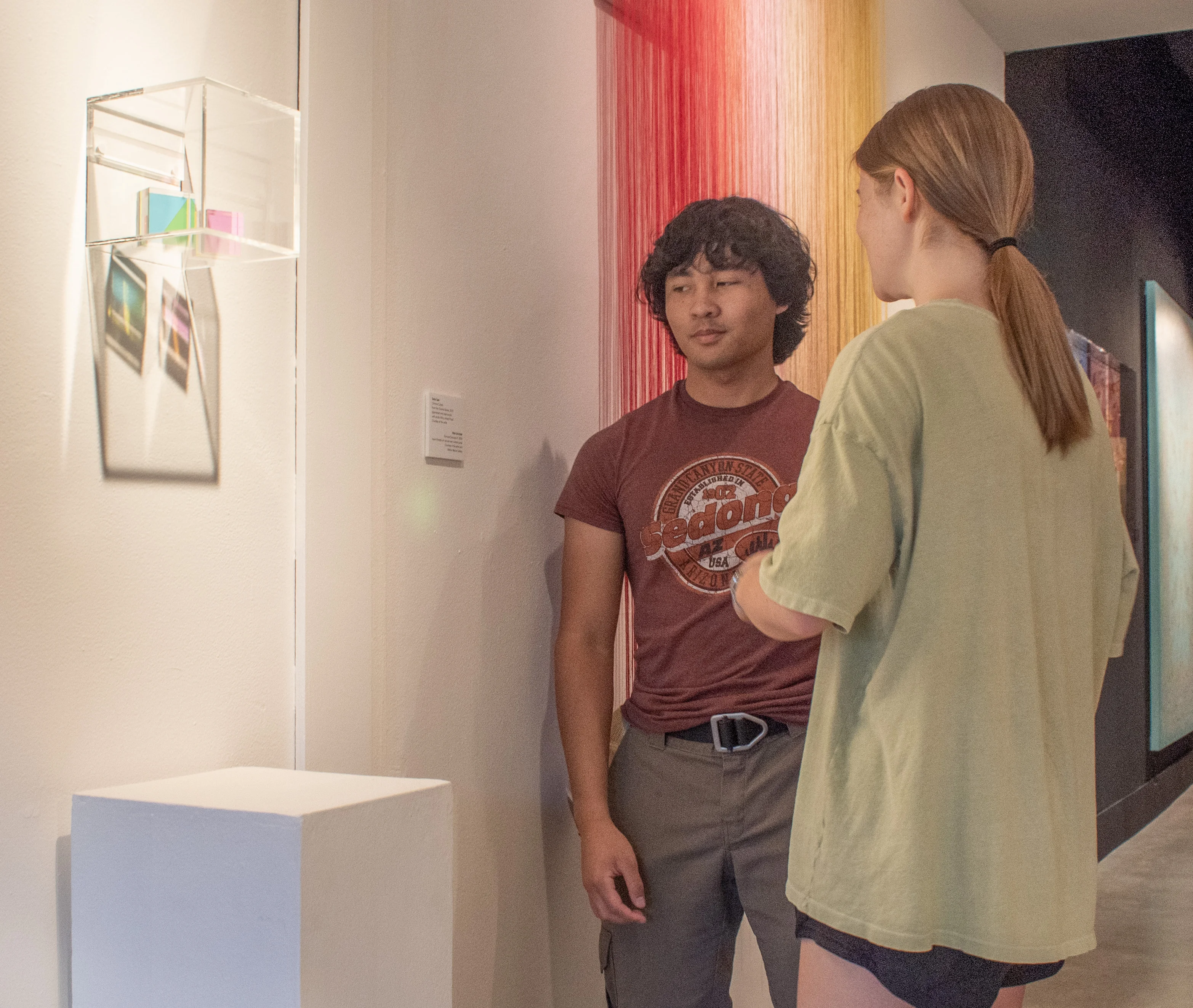 Vistiors viewing artwork by Seda Saar.