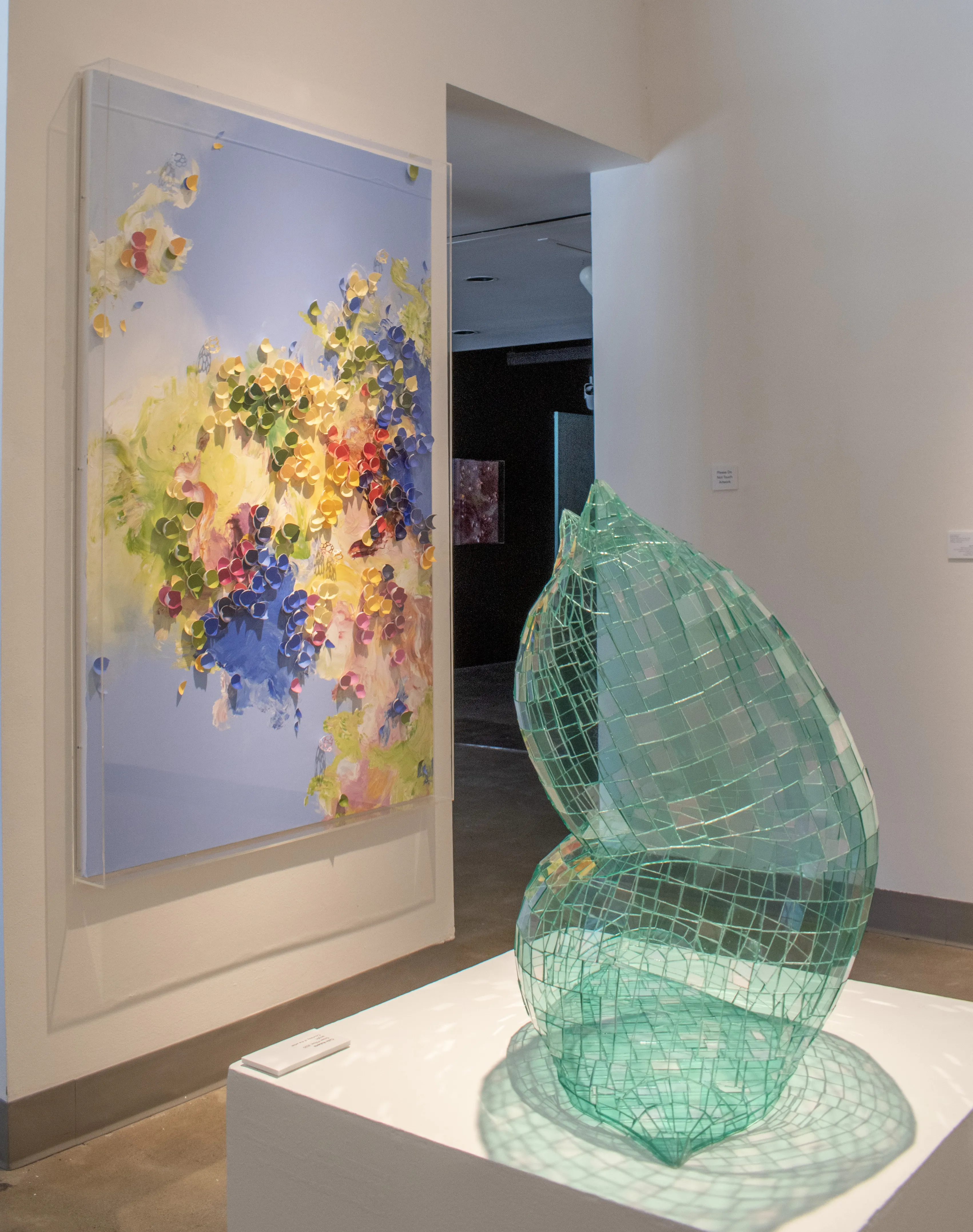 Installation view of the West Gallery featuring artwork by Colin Roberts and Larisa Safaryan.