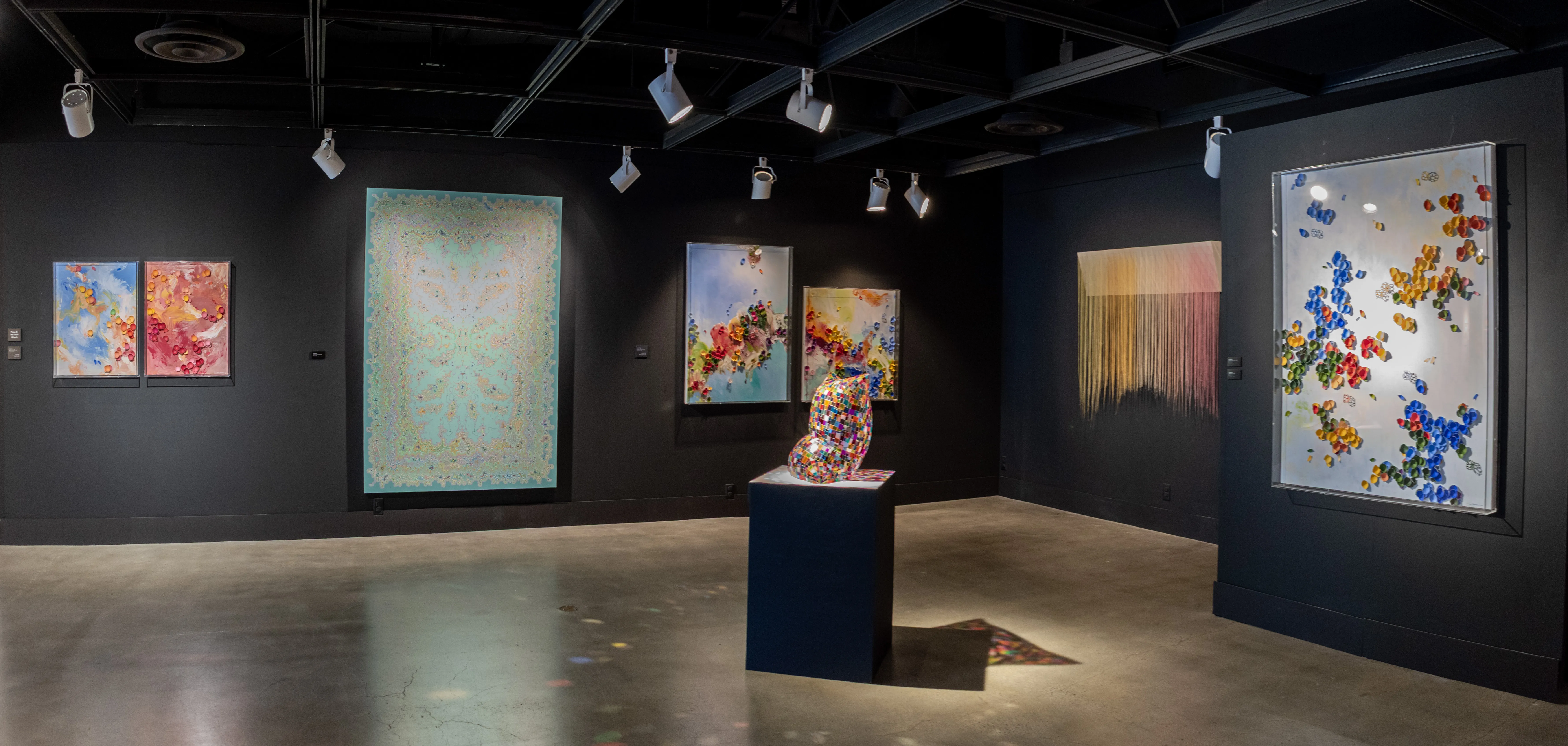 Installation shot of the Back Gallery's east and south wall.