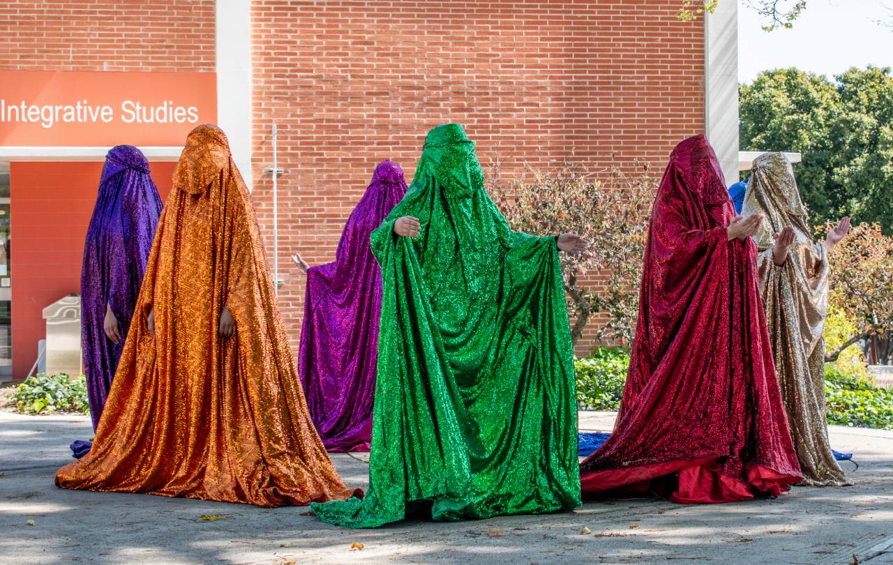 Rainbow Brigade performance still shot.