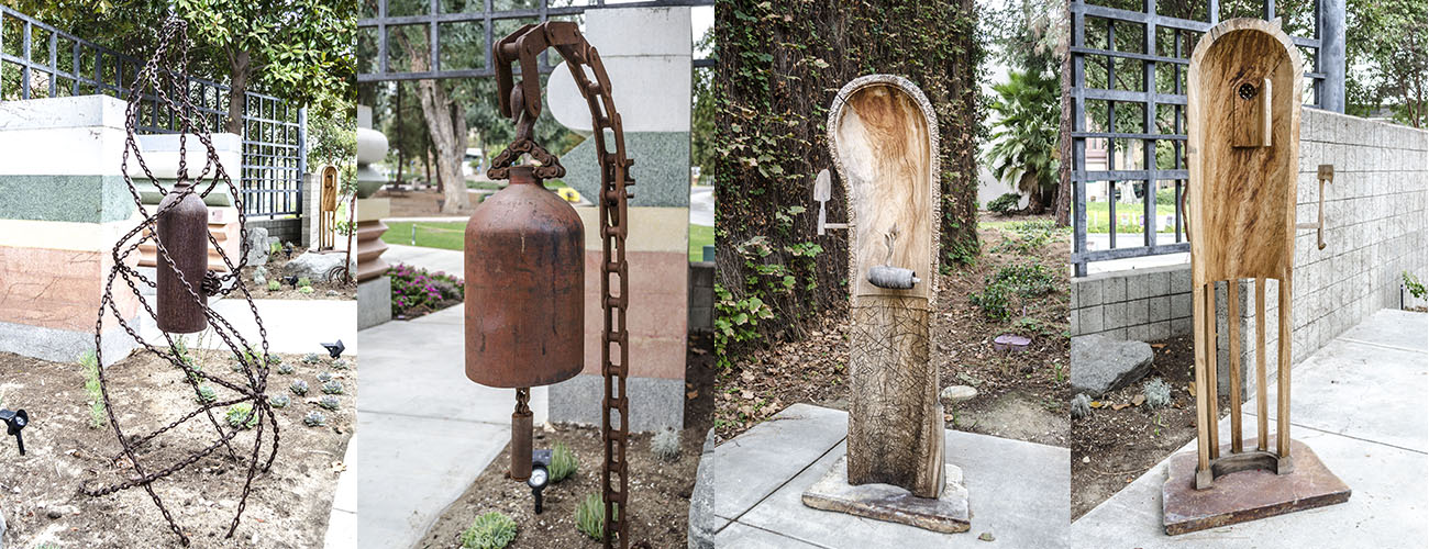 Images (left to right): Artwork Courtesy of the Artist William Fillmore from the "Post-industrial Harmony" Series, 2012, recycled chains, steel, and tank. "Flow," 84 x 36"; "Linkage," 48 x 36". Artwork Courtest of Fred Rose from the "Ghost Posts" Series, 2012, Stringybark eucalyptus (eucalyptus obliqua) collected from damaged trees from the Los Angeles Arboretum after the Dec 1, 2011 windstorm. "I Plant Where Things Have Been Buried," 74 x 24 x 14”; "The Lumberjack Says 'Boo'," 73 x 22 x 6”.